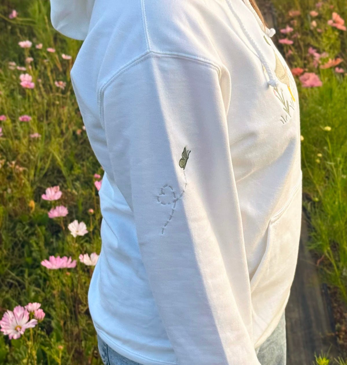 Duck in the flower garden embroidered adult hoodie