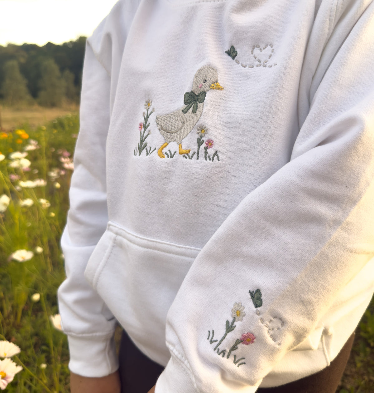 Duck in the flower garden, Signature Embroidered hoodie, ages 7-13