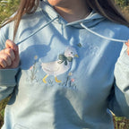 Duck in the flower garden embroidered adult hoodie