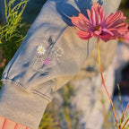 Duck in the flower garden embroidered adult hoodie